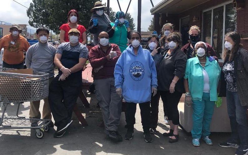 Earthquake & Pandemic Service COVID Volunteers Distributing Resources Outside Crew