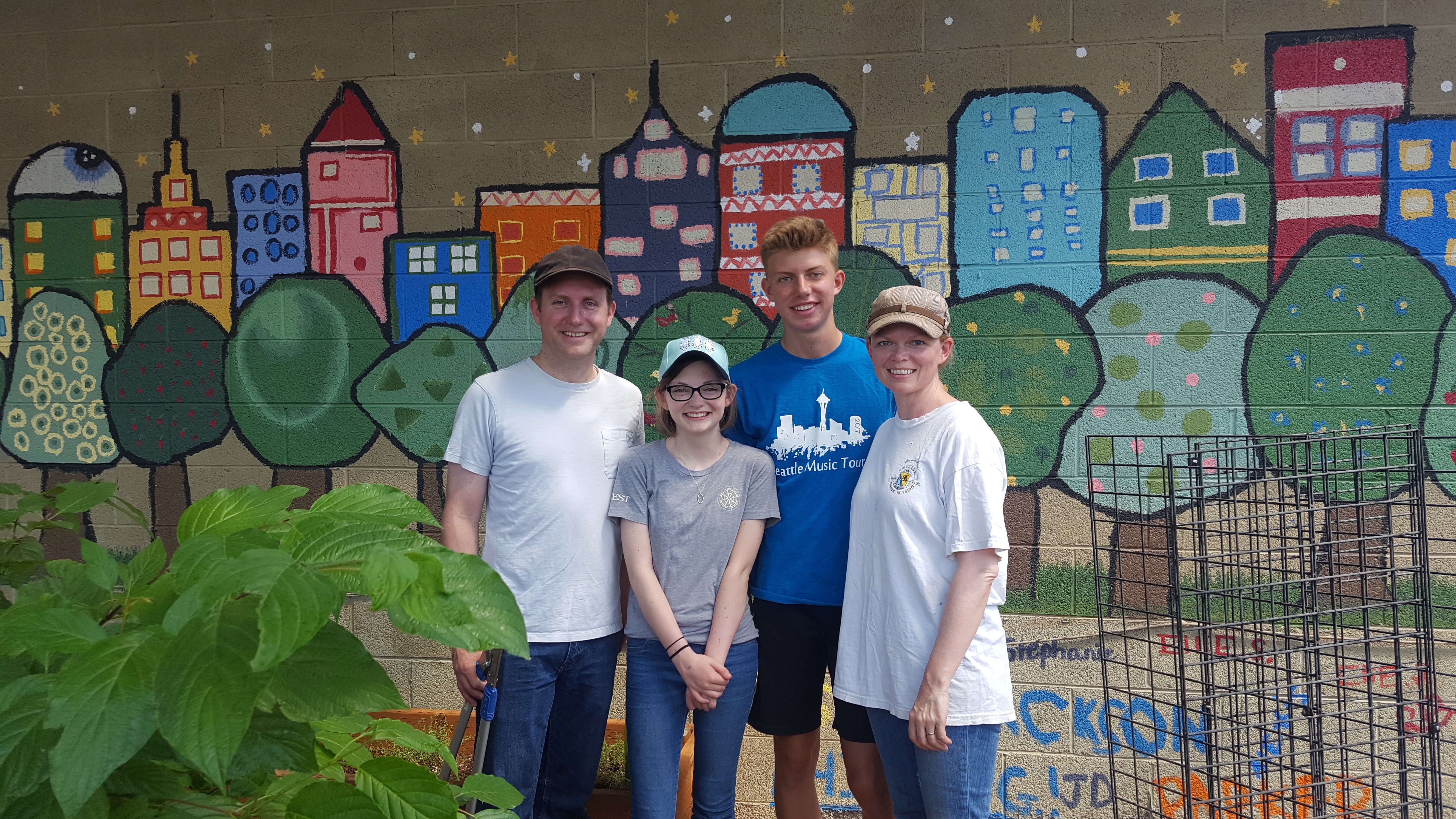 Dunbar Family - First Family with JustServe Serving at MOSAIC MOSAIC Refugee Mary Murals & Urban Gardens