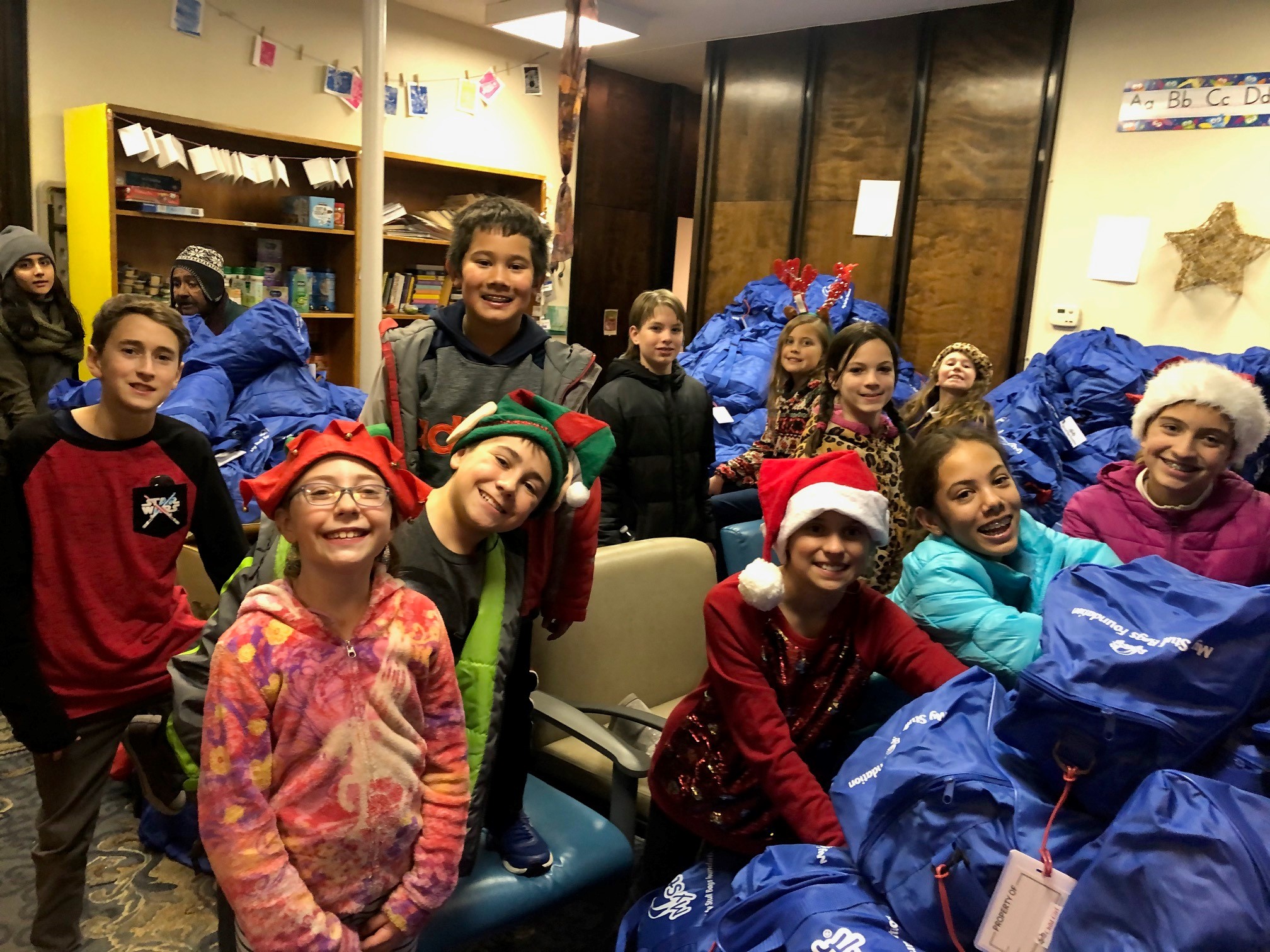Elves & Angels Youth Group Organizes Giving to 1000+ Kids! Good Shepherd Lutheran Church (UT) Rise Pre-Teens Give Joy+Organize Toys