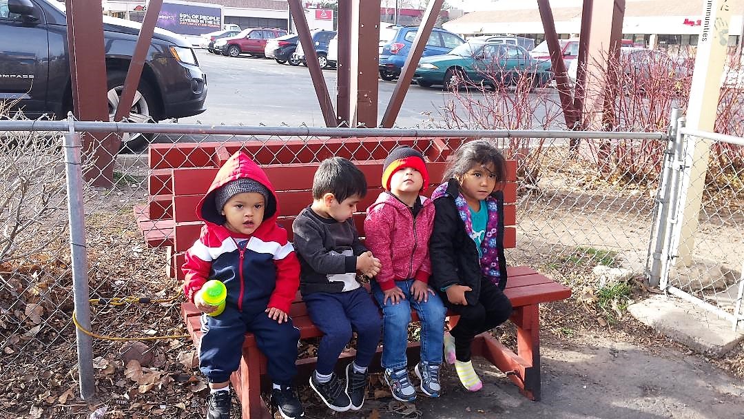 Children at Manna Market Food Day - Hanging Out Food for the Children